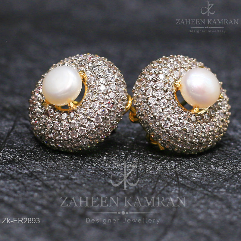 Zircons Pearl Tops