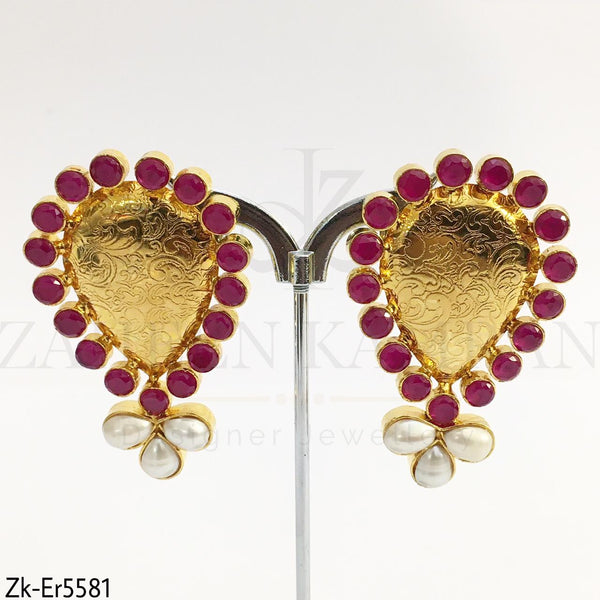 Textured ruby earrings