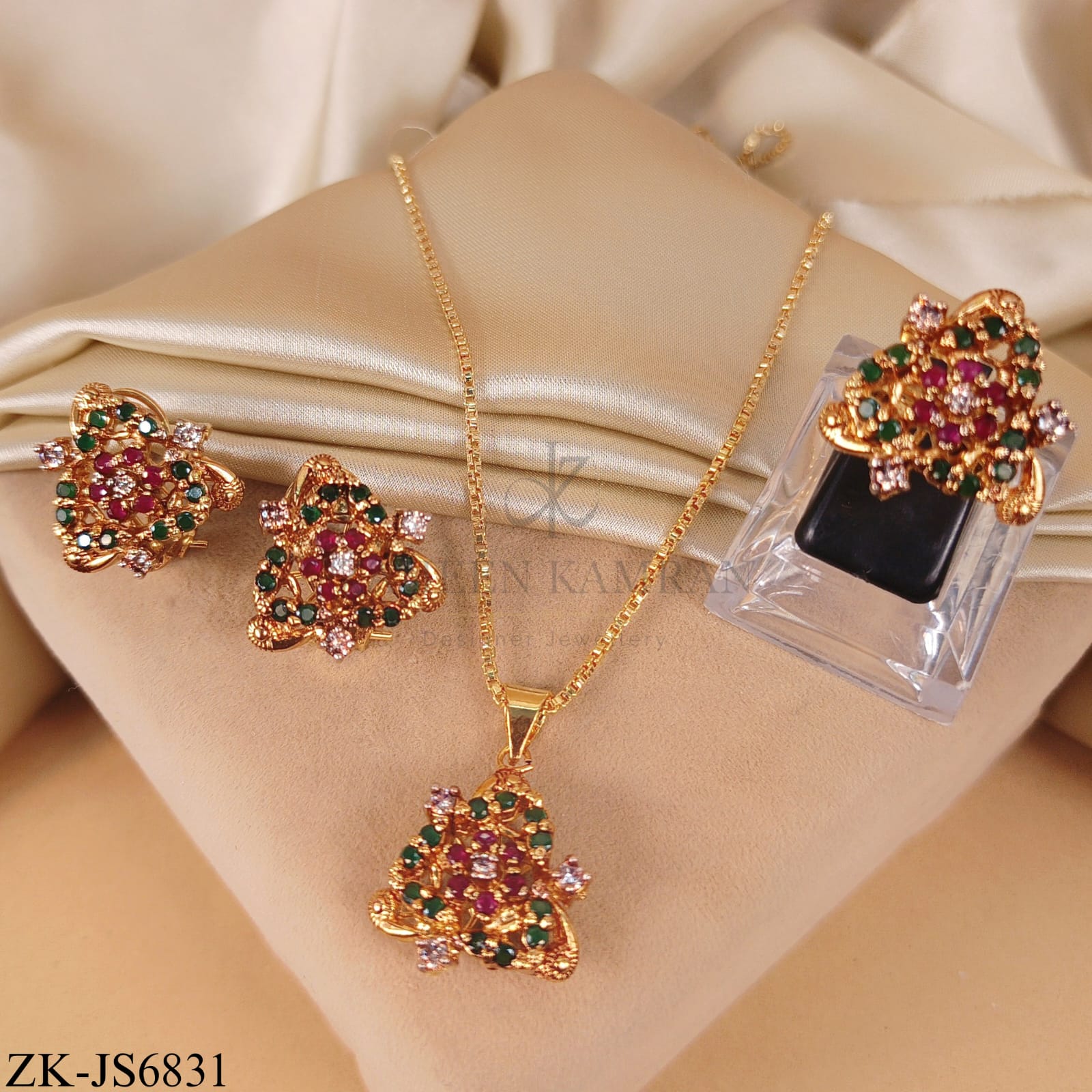 ELEGANT GOLD SET WITH RUBY EMERALD ACCENTS