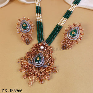 ANTIQUE EMERALD CENTRE CHAMPAGNE SET