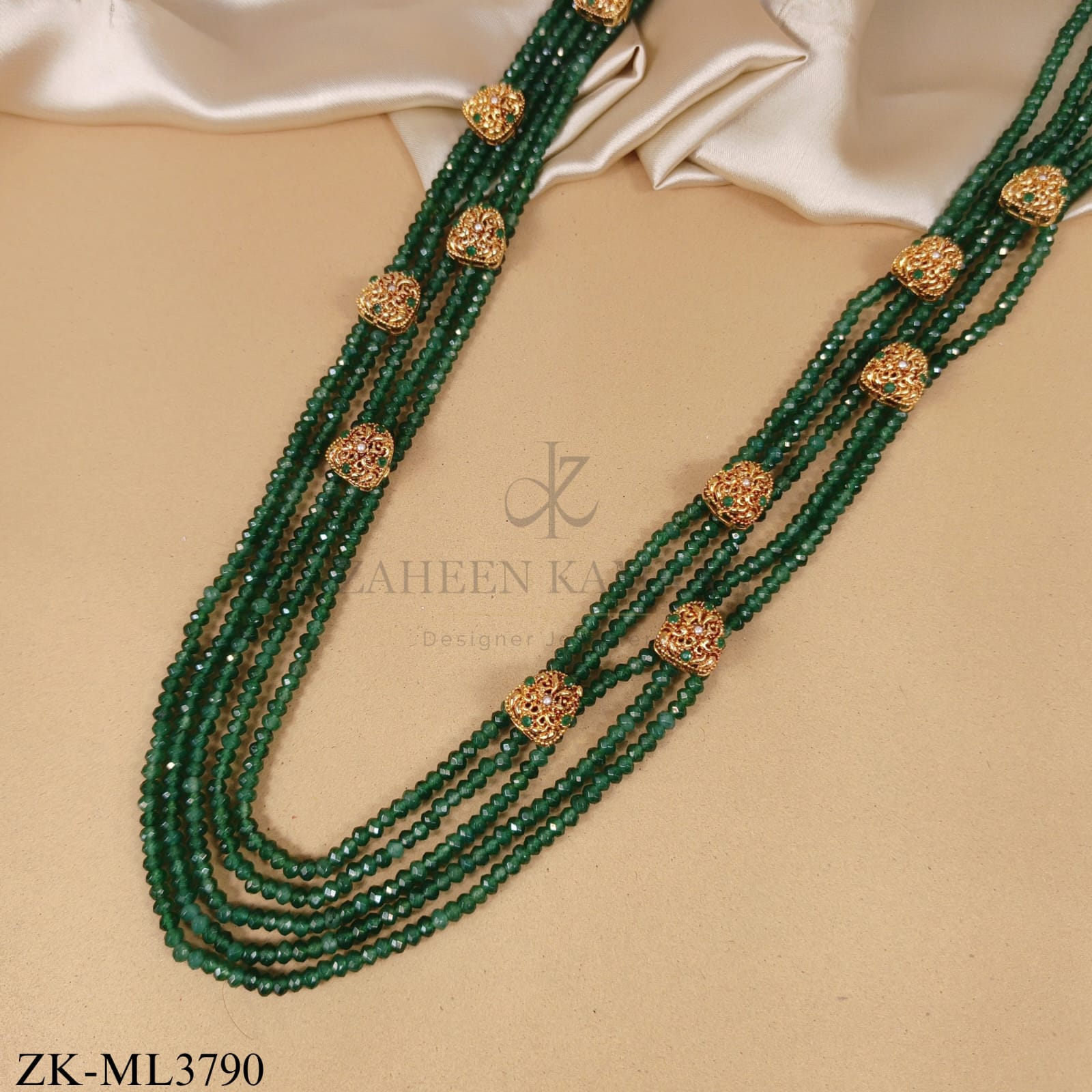 GOLD EMERALD FOUR STRING CASCADE MALA
