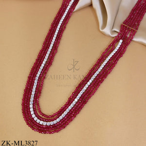 MULTI LAYERED RUBY MALA WITH ZIRCONIAN CENTRE