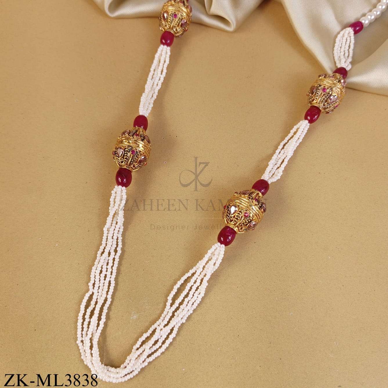 GOLDEN SPHERE RUBY PEARLS MALA