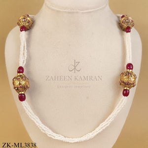 GOLDEN SPHERE RUBY PEARLS MALA