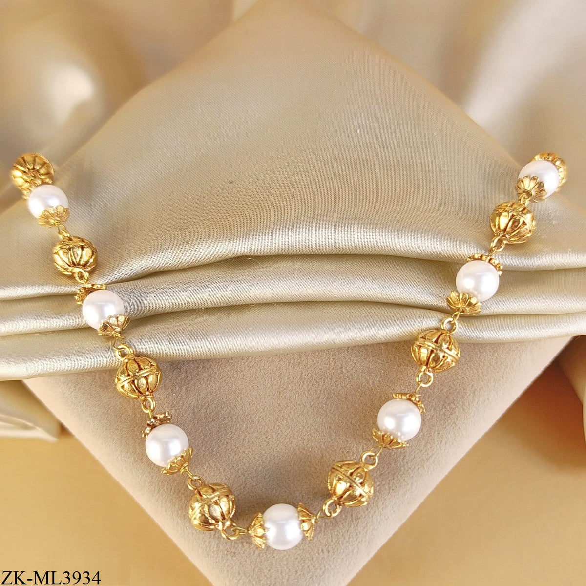 PEARLS CARVED MALA