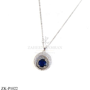 Silver round pendant with blue centre stone - Zaheen Kamran