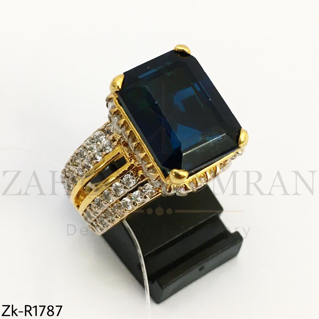 Gold sapphire zircon ring