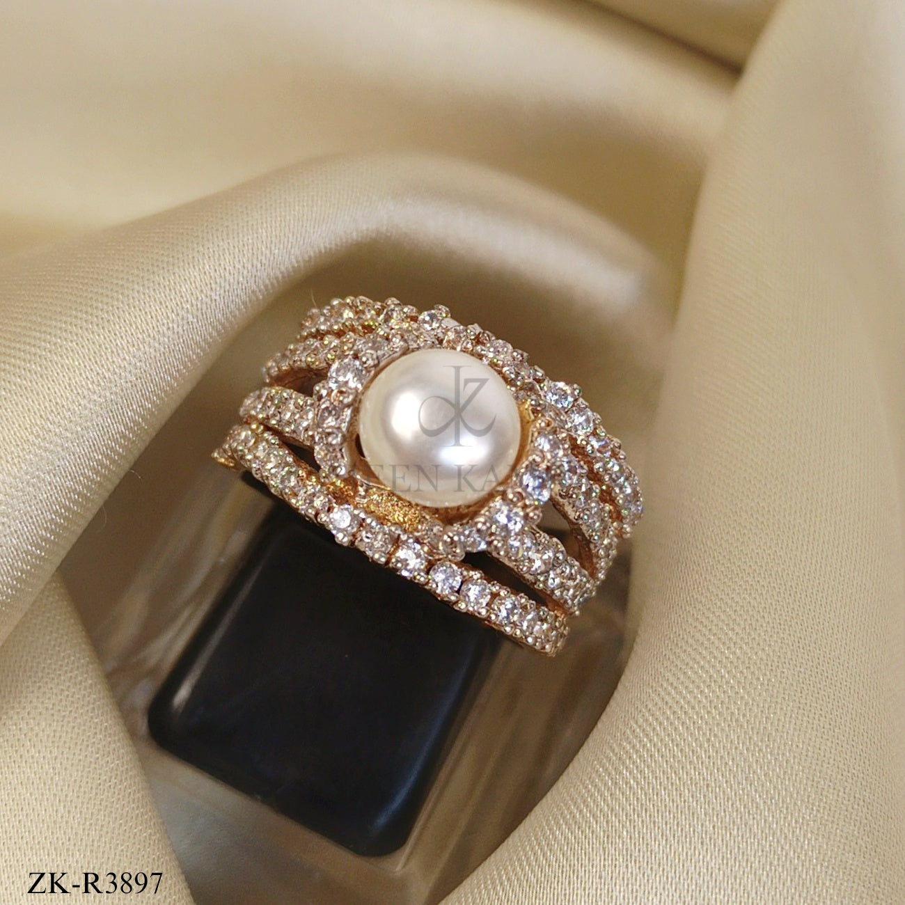PEARL CENTRE HALO WITH ZIRCONS RING