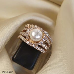 PEARL CENTRE HALO WITH ZIRCONS RING