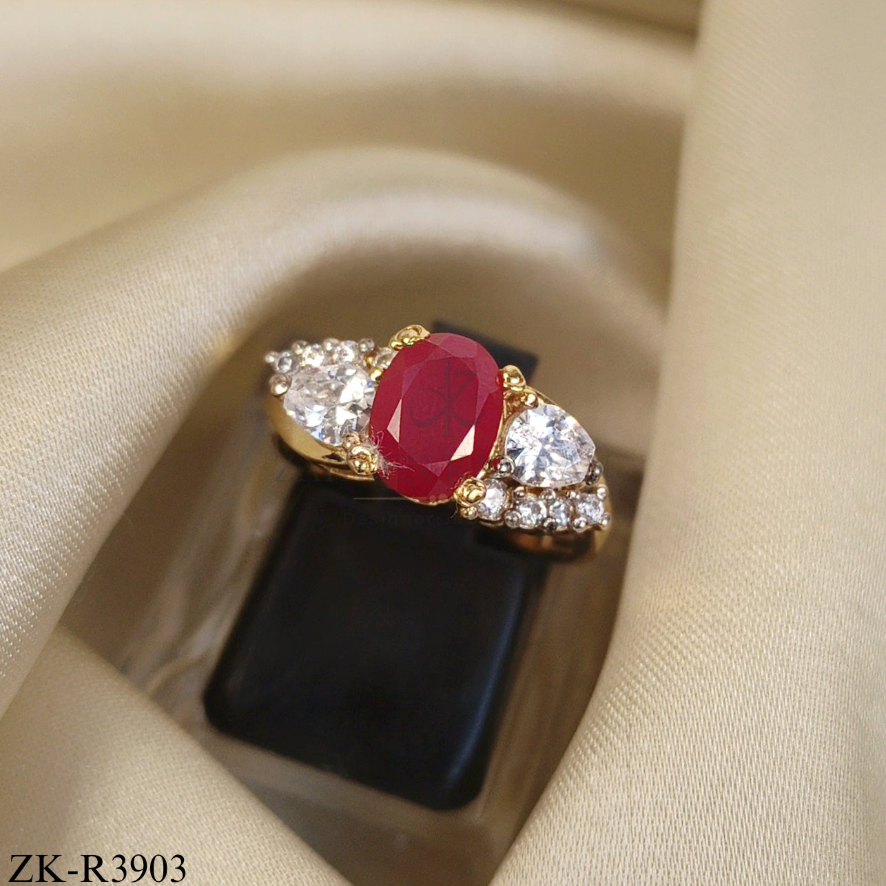 RUBY CENTRE WITH DUAL ZIRCON RING