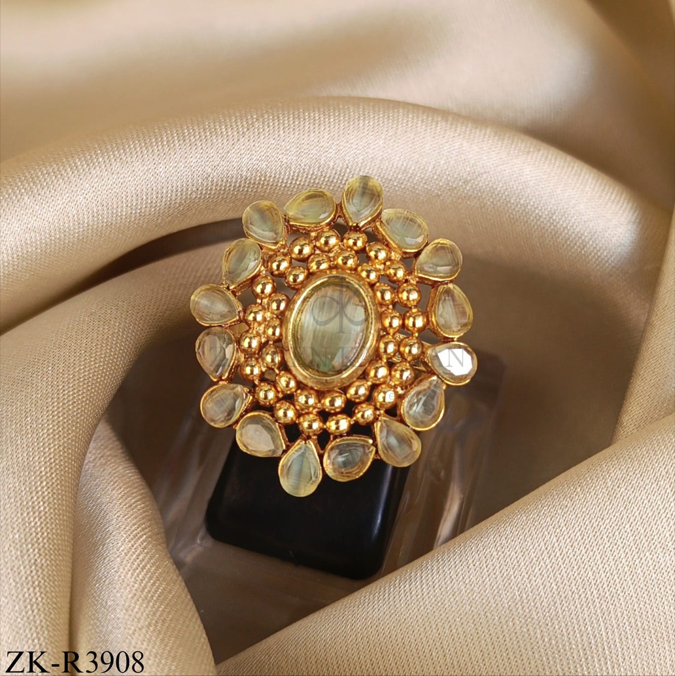 PEAR-CUT EMERALD RING