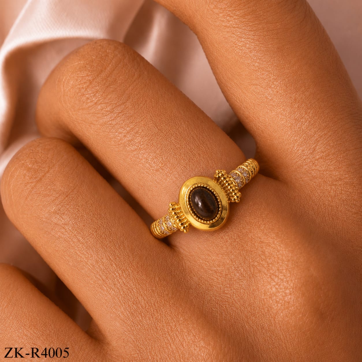 OVATE BROWN RING