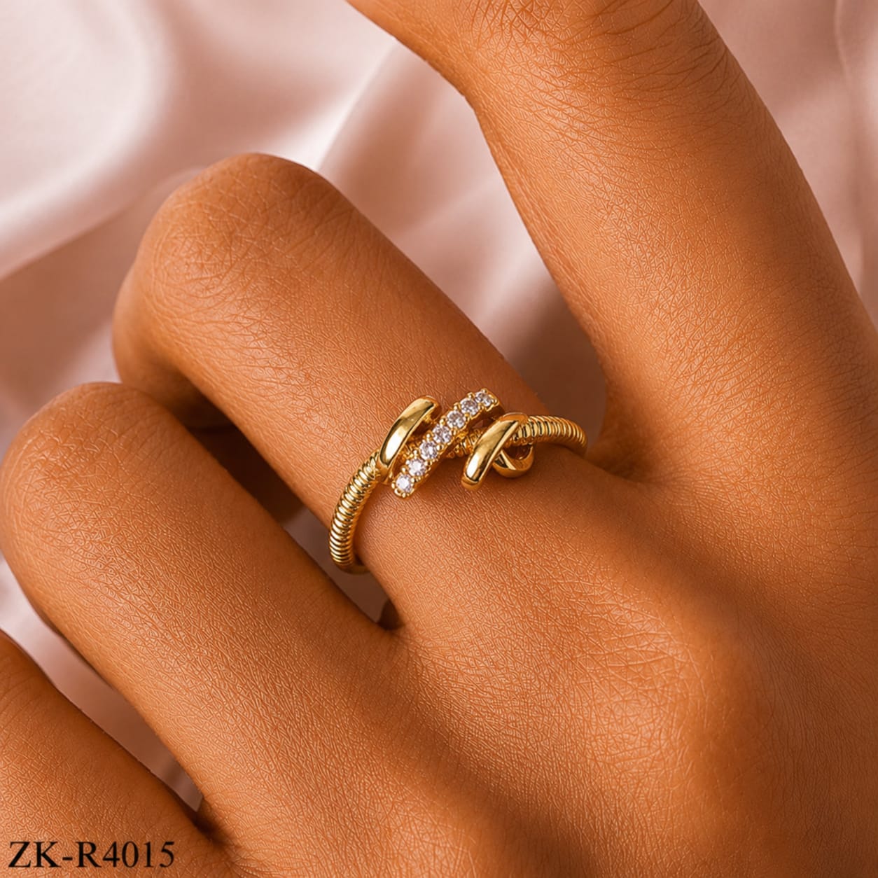 CROSSED BAND RING