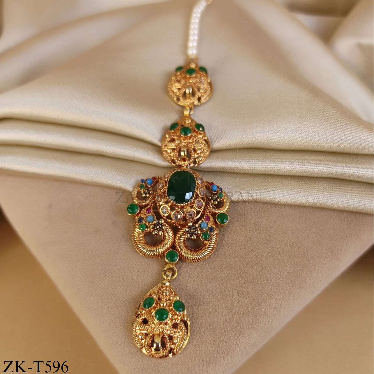 GOLD TONE EMERALD INTRICATE TIKKA