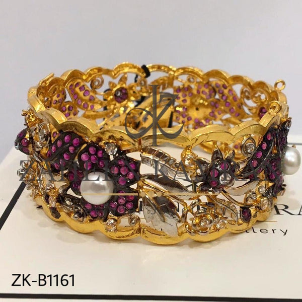 Glorious Traditional Bangle with Pink Zircon