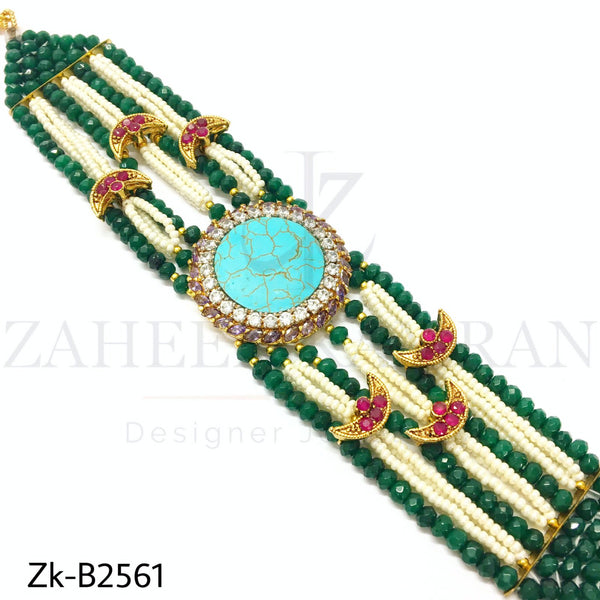 Handwoven Feroza emerald bracelet