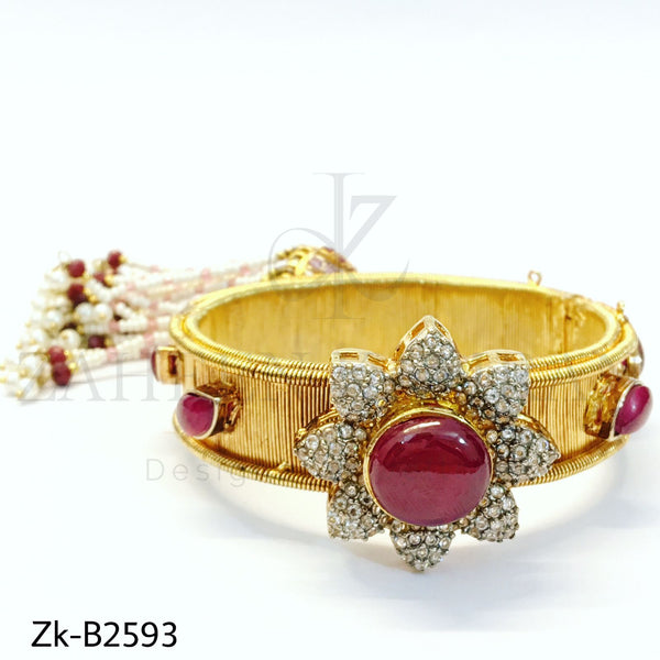 Stylish ruby tussle bangle