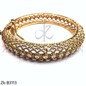 Classy golden bangle.