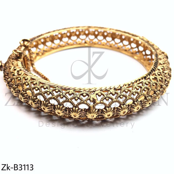 Classy golden bangle.