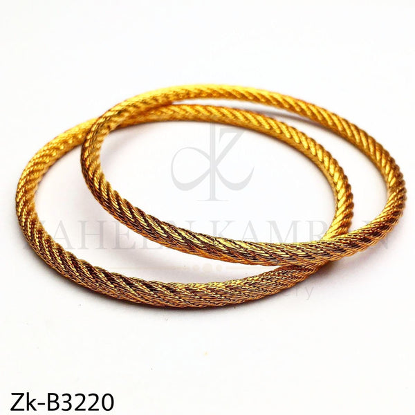 Simple golden bangles.