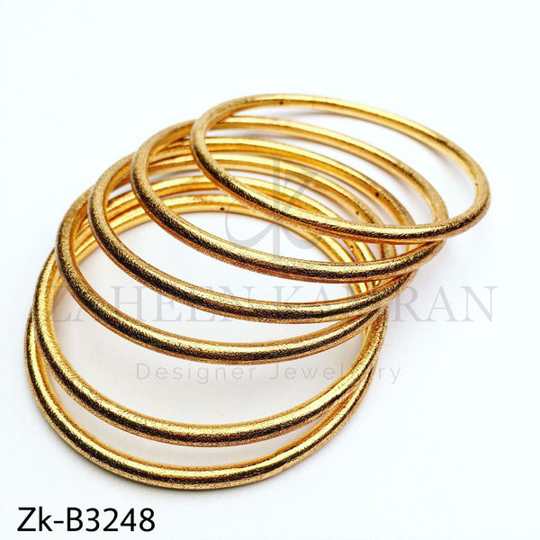 Classy golden bangles.