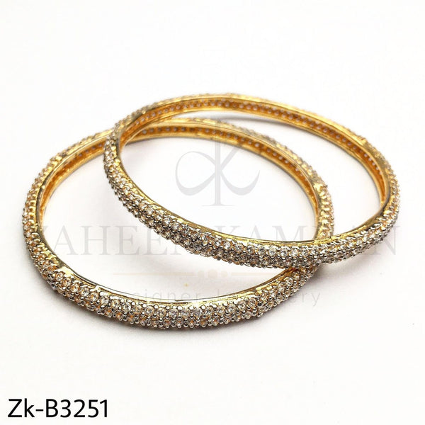 Zirconium golden bangles.