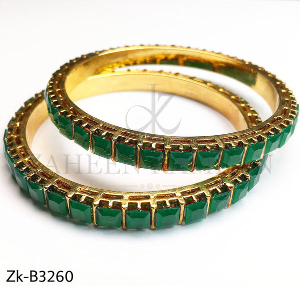 Emeralds golden bangle