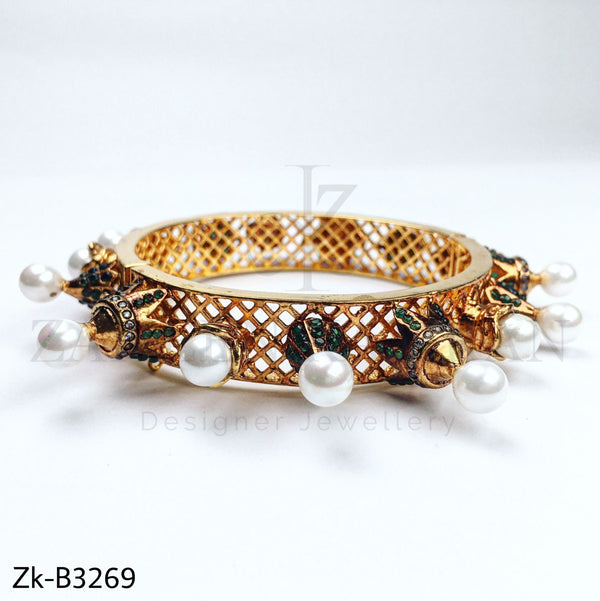 Crown styli bangle.