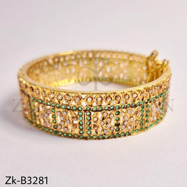 Adorable golden bangle.