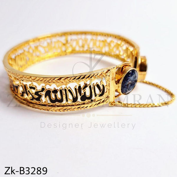 Kalma golden bangle.