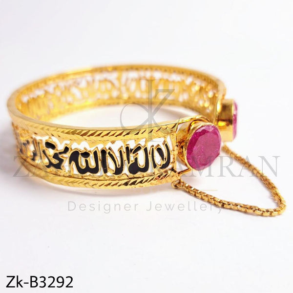 Kalma golden bangle.