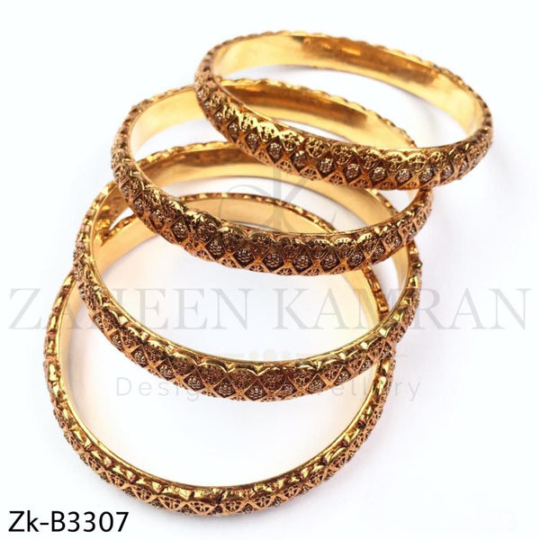 Classic golden bangles.