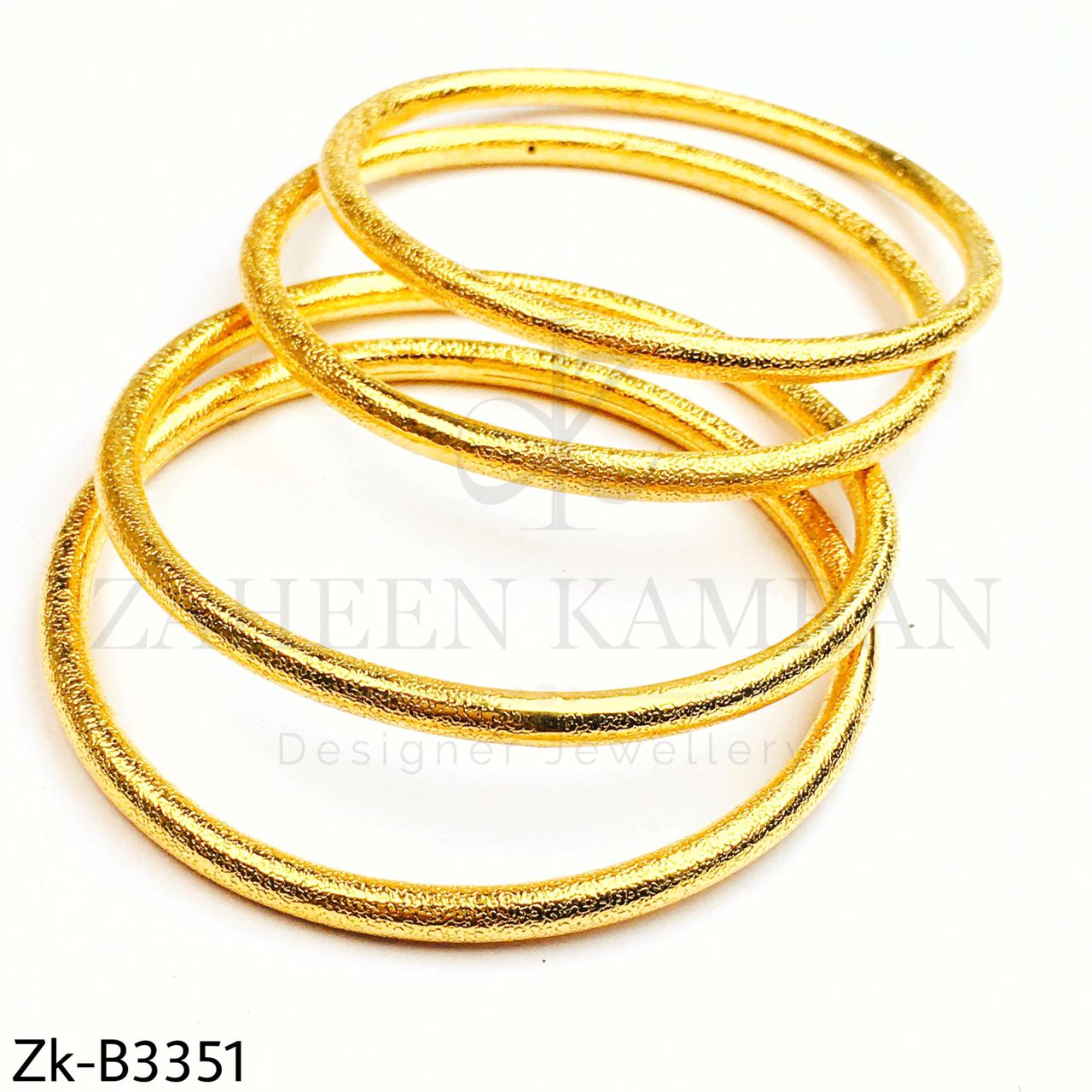 Decent golden bangles.