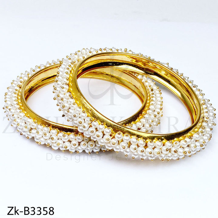 Pearlised bangles.