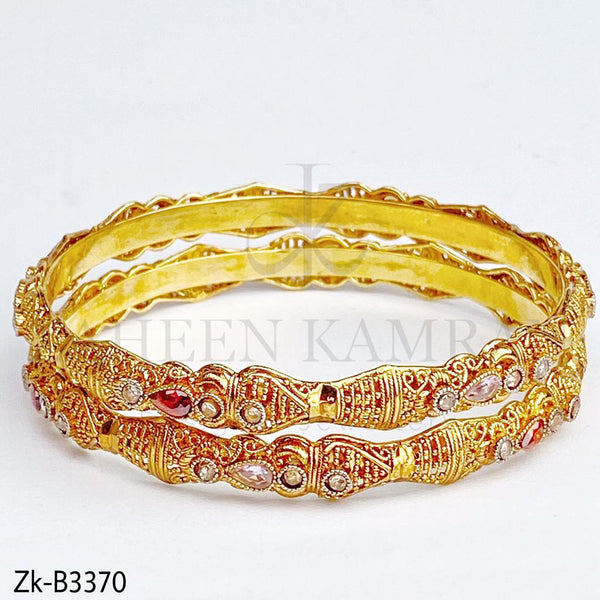 Classic golden bangles.