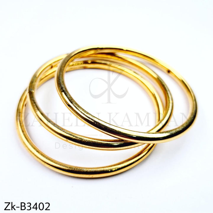 Simple golden bangles.