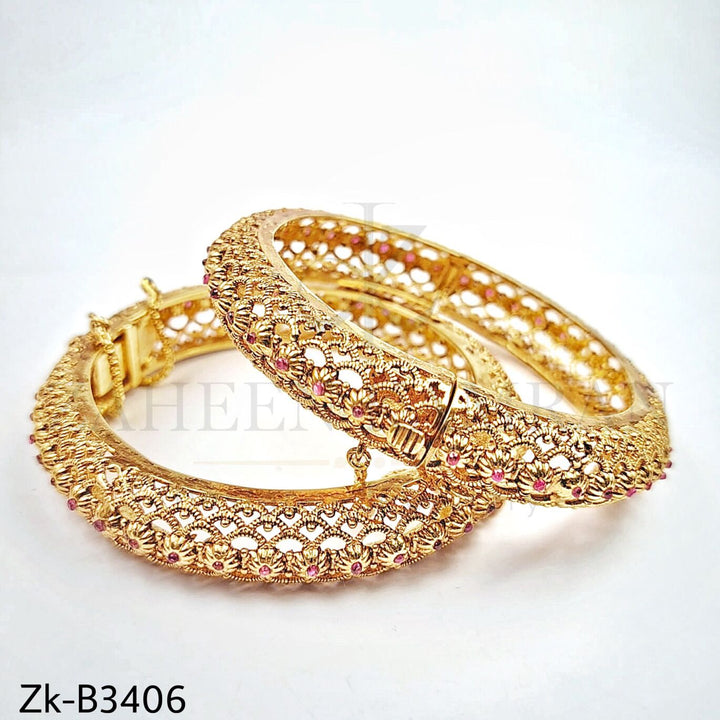 Floret golden bangles.