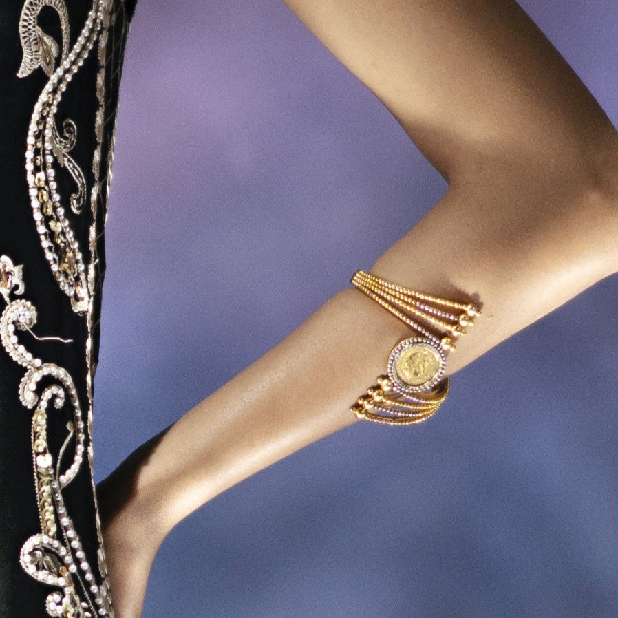 Coin bangle.