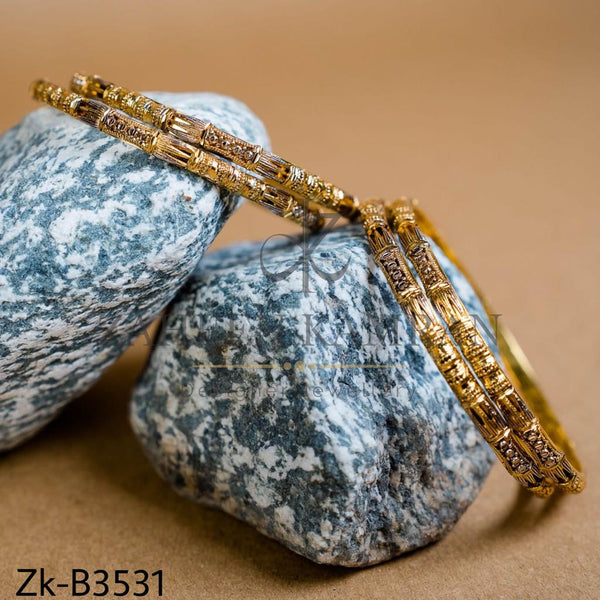 AURA GOLDEN BANGLE