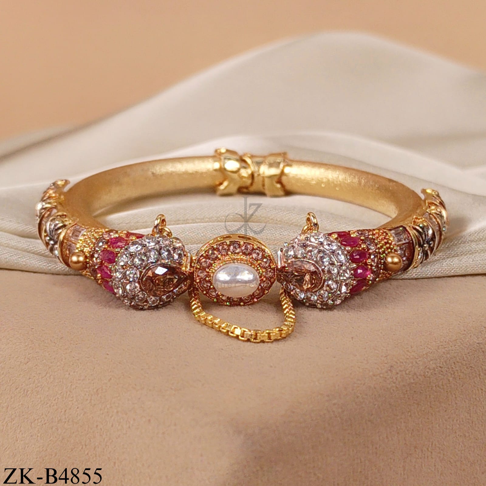GOLDEN BANGLE WITH RUBY AND PEARLS ACCENTS