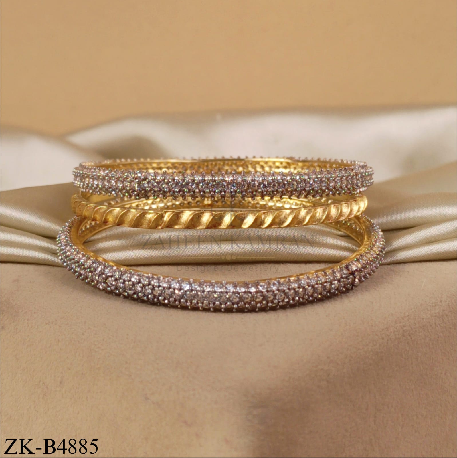 GOLDEN TRIO TWISTED AND ZIRCONIAN BANGLES