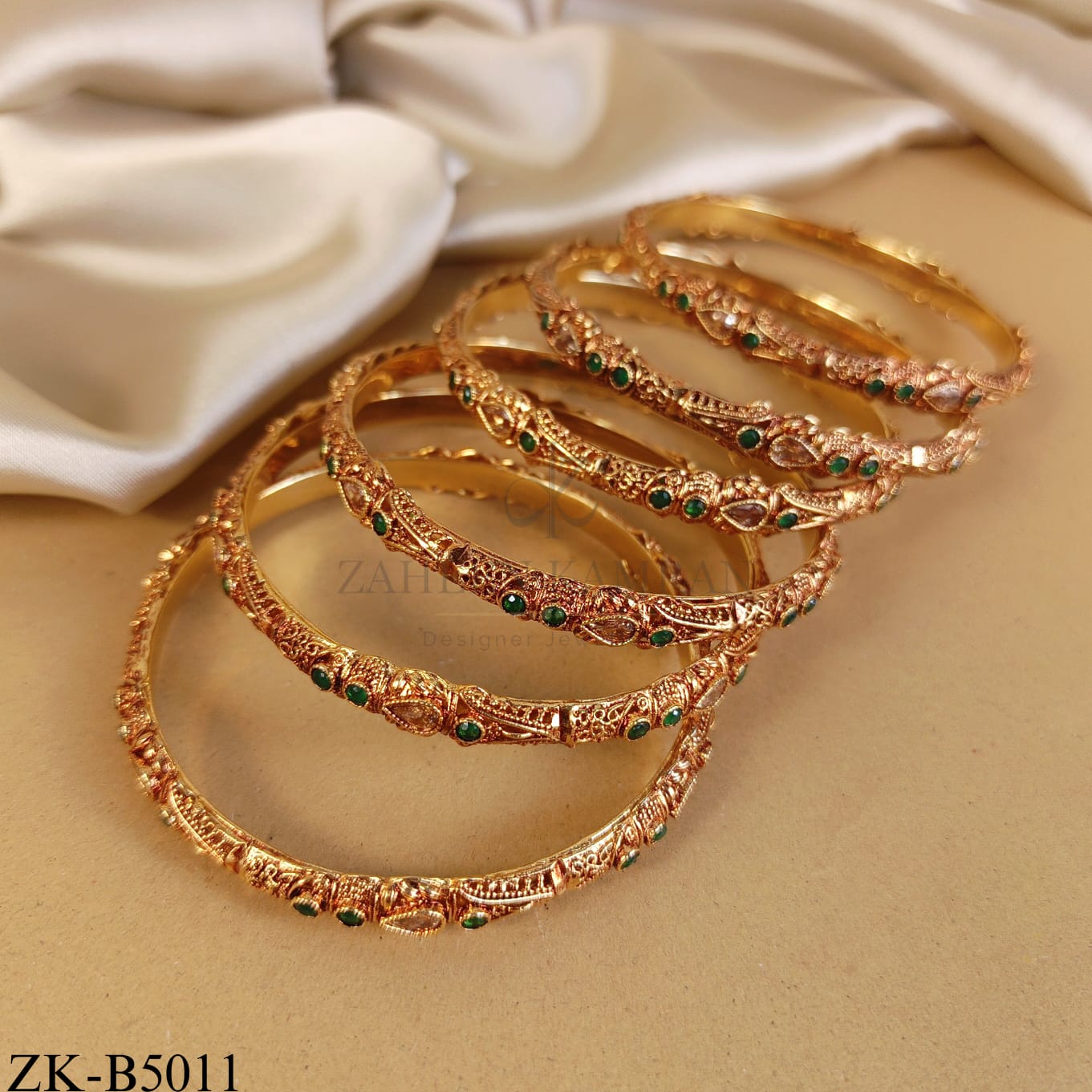 EMERALD CHAMPAGNE BANGLES