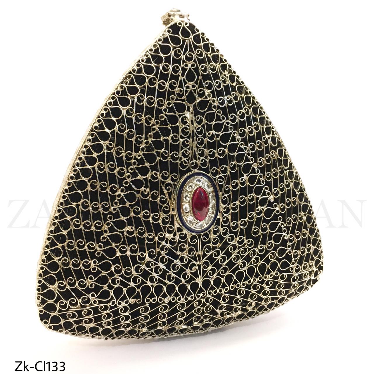 Handcrafted triangular Clutch