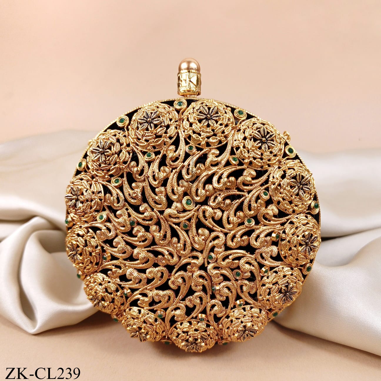 CIRCULAR EMERALD CLUTCH