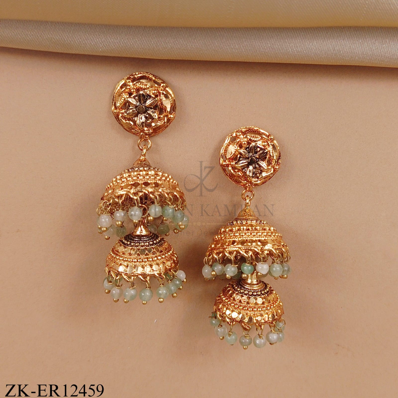 GOLDEN DOUBLE EARRINGS WITH EMERALD ACCENTS