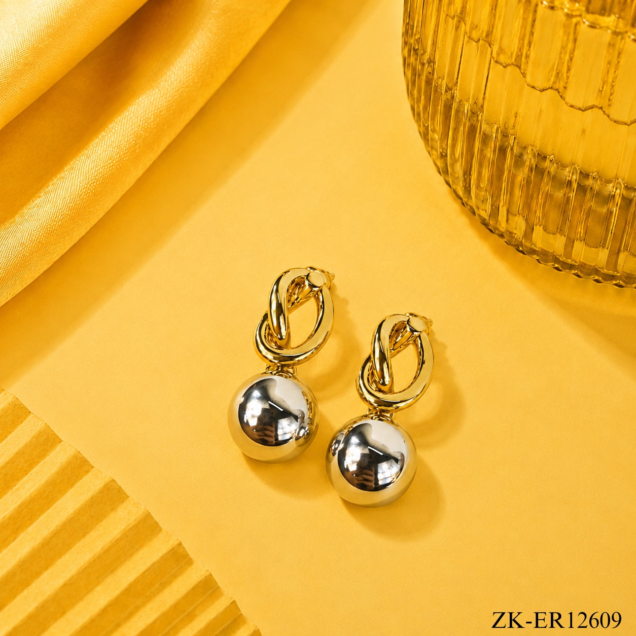 DUAL TONE KNOT EARRINGS