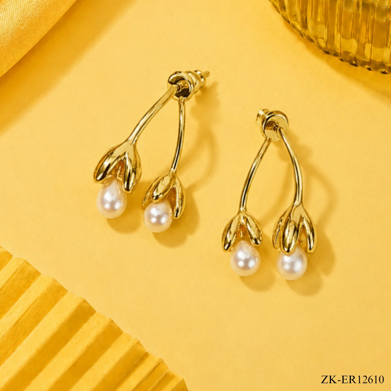 GOLD TONE CURVED STEMS EARRINGS
