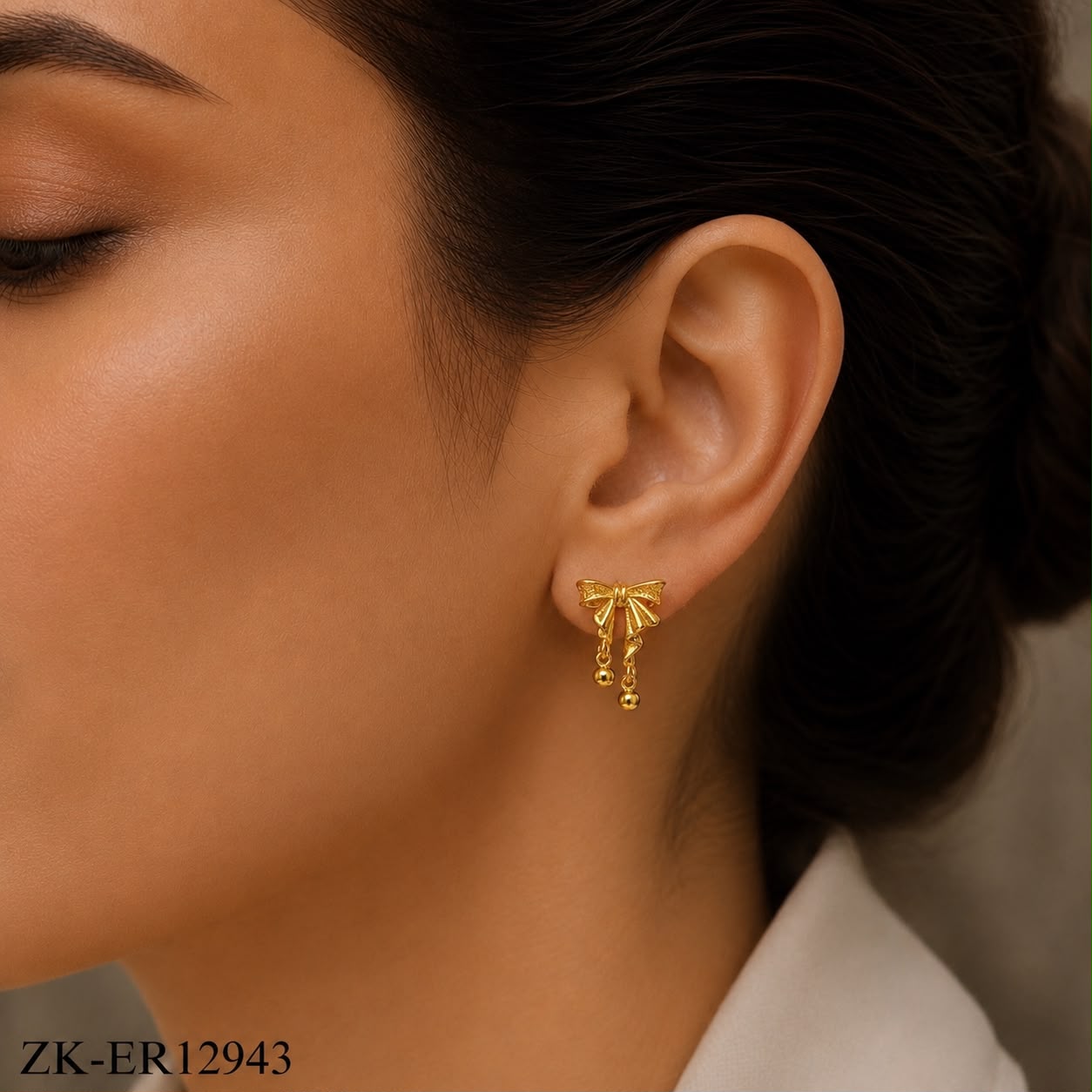 GOLDEN BOW EARRINGS