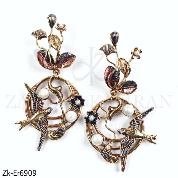 Flower bird earrings.