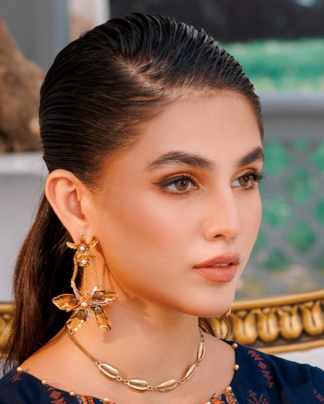 Gold star earrings